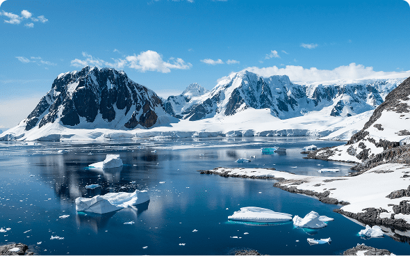 Snowy mountains and icebergs in Antarctica