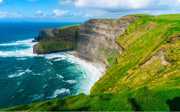 Coastal cliffs with green landscape