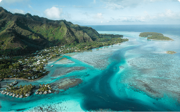 Tropical island with turquoise waters and mountains